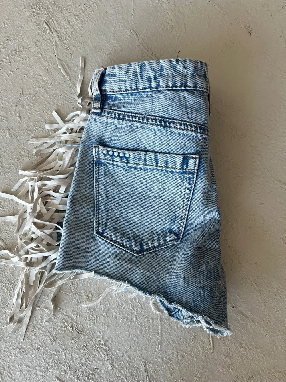 Blank NYC Light Wash Denim Fringe Side High-Rise Shorts